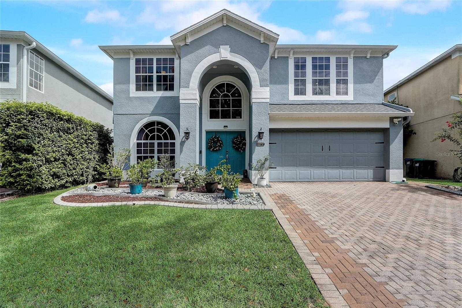 photo 1: 12717 WINDING WOODS LANE, ORLANDO FL 32832