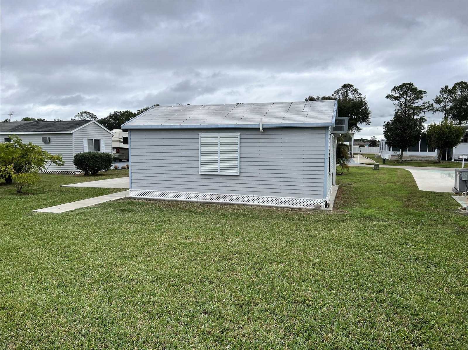 photo 3: 5096 SOUTHSHORE DRIVE, POLK CITY FL 33868