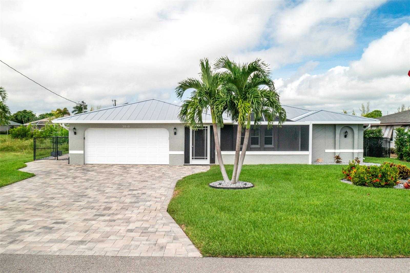 photo 1: 3010 SE 6TH AVENUE, CAPE CORAL FL 33904