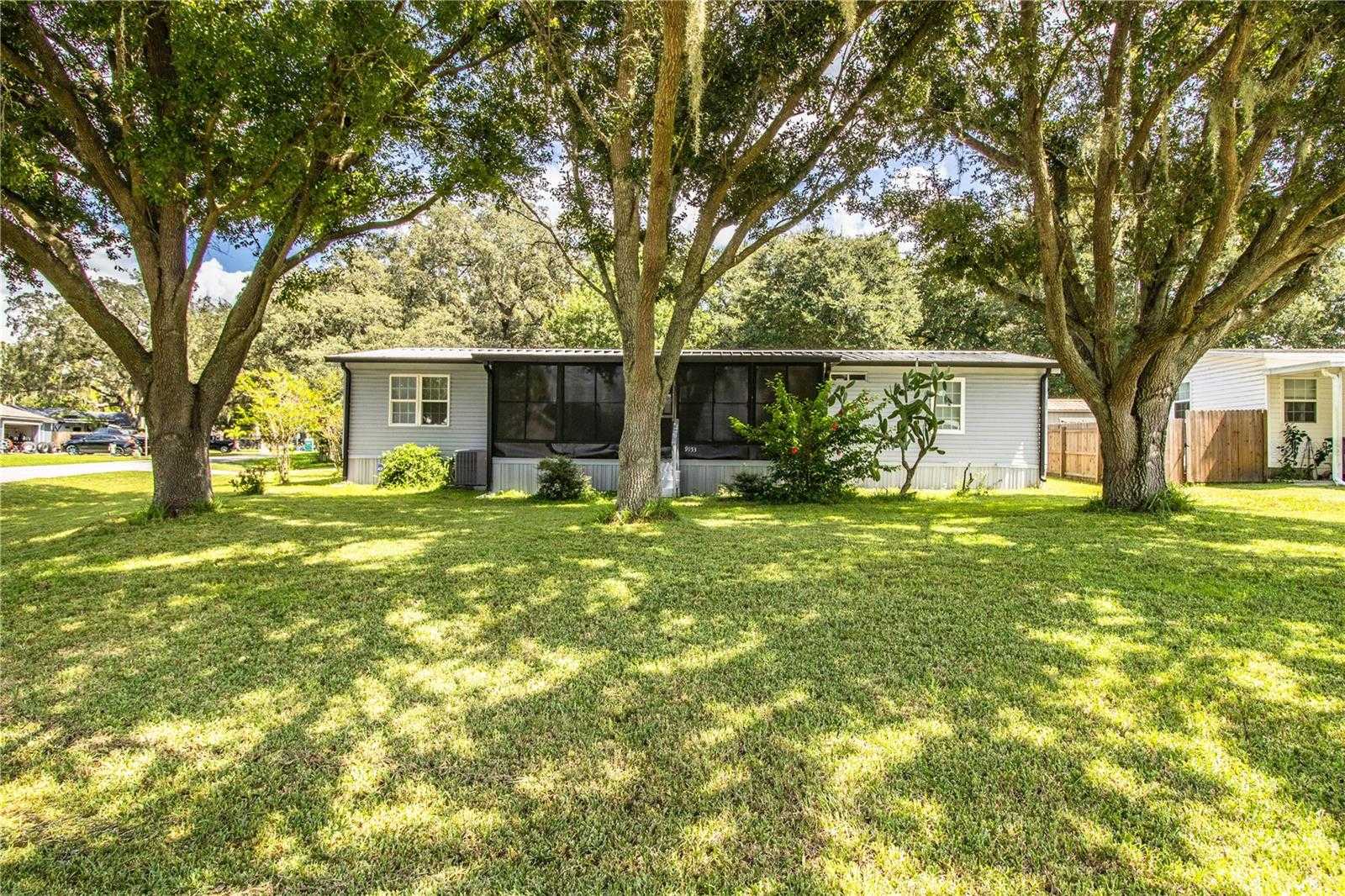 photo 1: 9153 SAMARITAN AVENUE, POLK CITY FL 33868