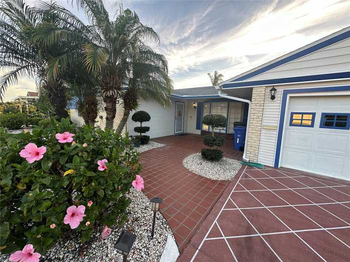 photo 2: 1409 W DEL WEBB BOULEVARD, SUN CITY CENTER FL 33573