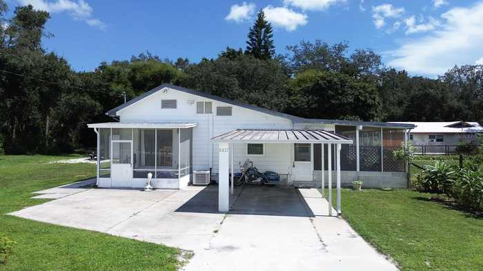 photo 1: 6827 COUNTY ROAD 17 S, SEBRING FL 33876