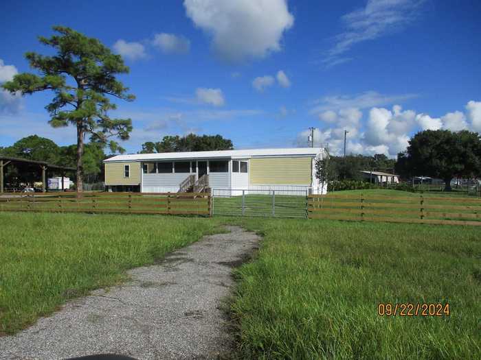 photo 2: 5198 STATE ROAD 710 E, OKEECHOBEE FL 34974