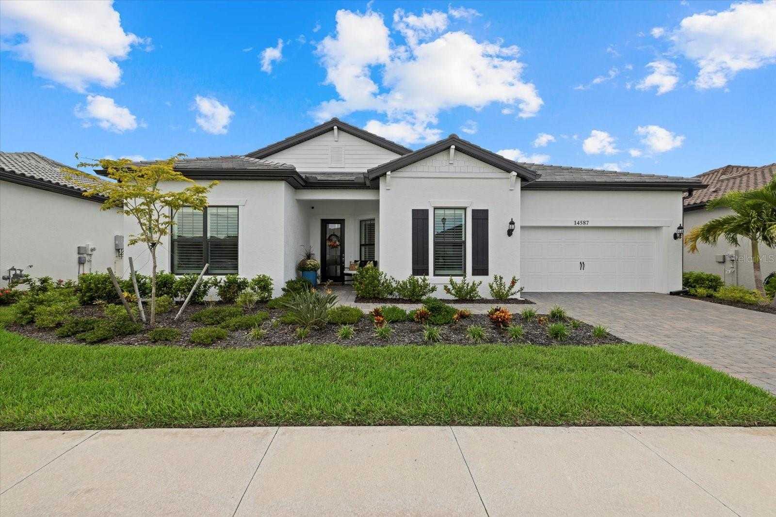 photo 1: 14587 BALD CYPRESS WAY, NOKOMIS FL 34275