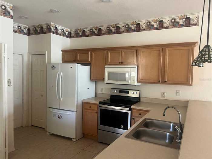 photo 2: 1380 INNSBRUCK CT, WINTER HAVEN FL 33884