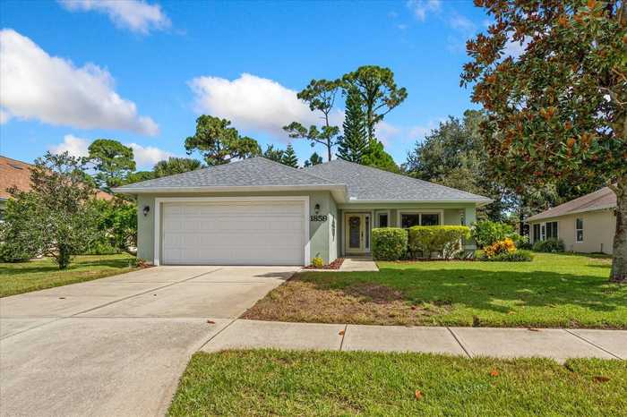 photo 1: 1859 TURNBULL LAKES DRIVE, NEW SMYRNA BEACH FL 32168