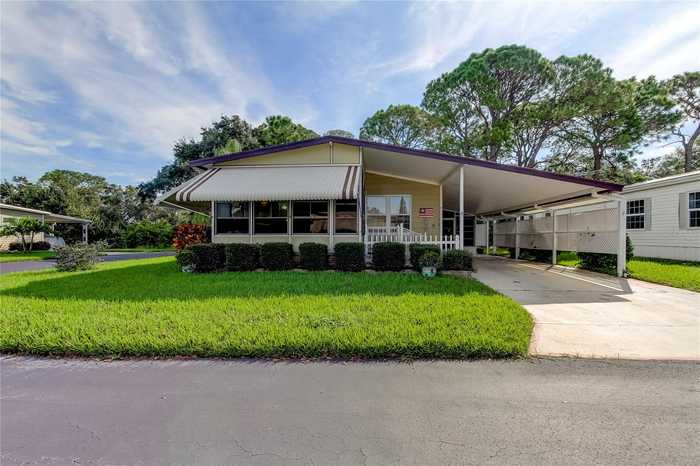 photo 1: 59 COTTAGEWOOD DRIVE Unit 142, SAFETY HARBOR FL 34695