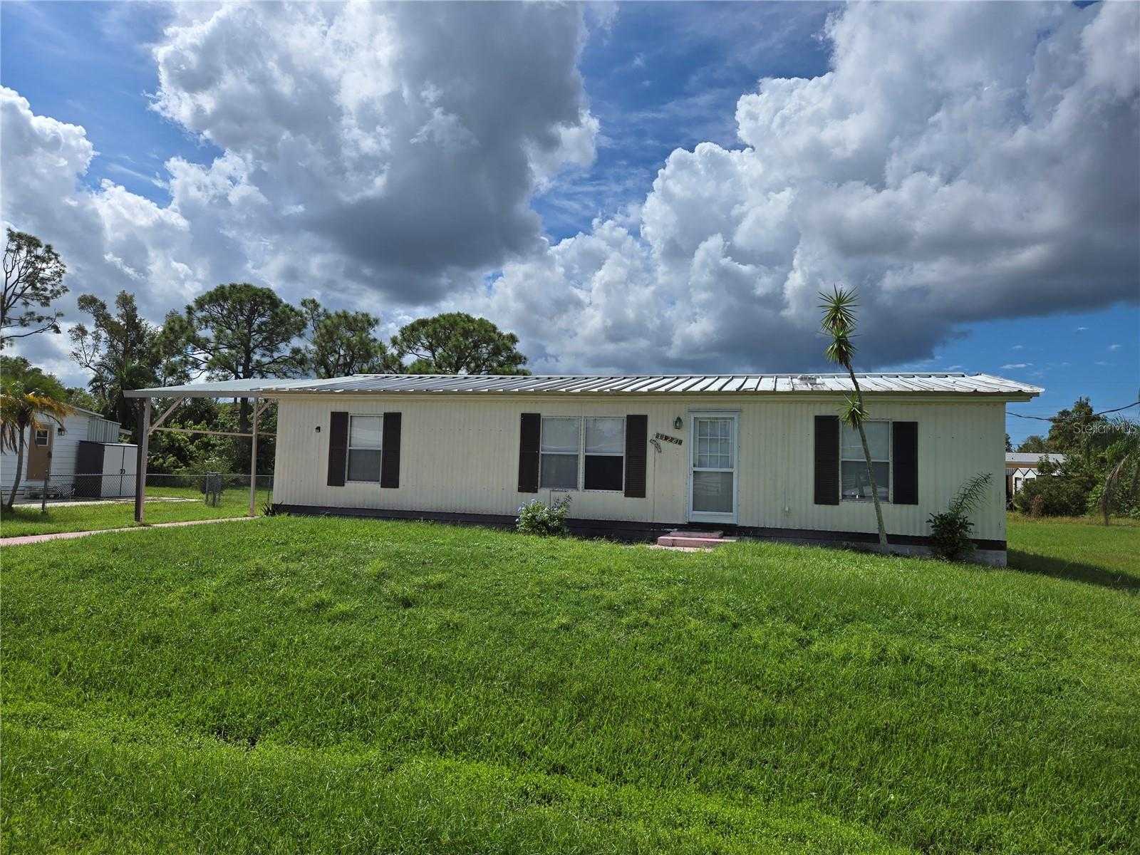 photo 2: 11281 PINEAPPLE ROAD, PUNTA GORDA FL 33955