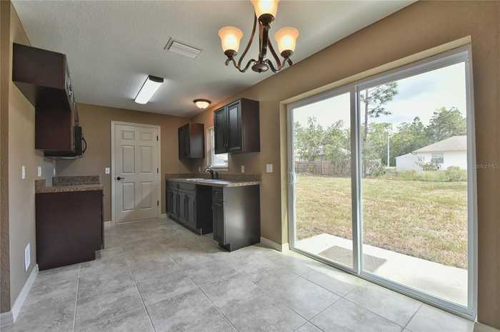 photo 2: 23657 NW AMBERJACK AVENUE, DUNNELLON FL 34431