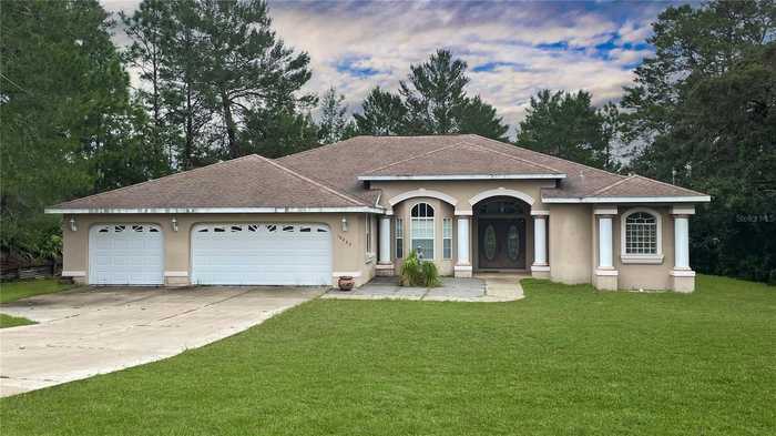 photo 1: 10427 GYPSY AVENUE, WEEKI WACHEE FL 34613