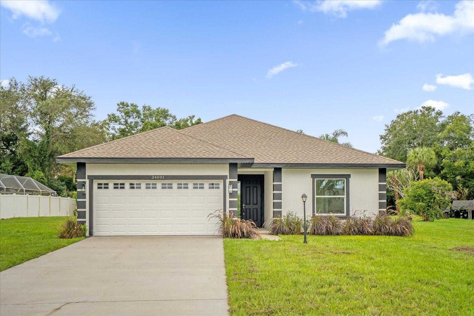 photo 1: 34001 VALENCIA DRIVE, LEESBURG FL 34788