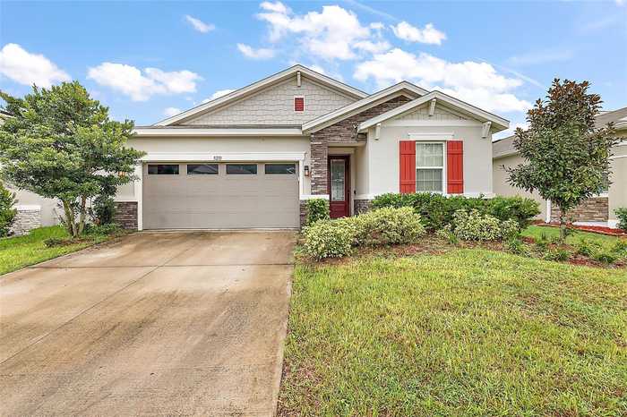 photo 1: 5233 MEADOW SONG DRIVE, OKAHUMPKA FL 34762