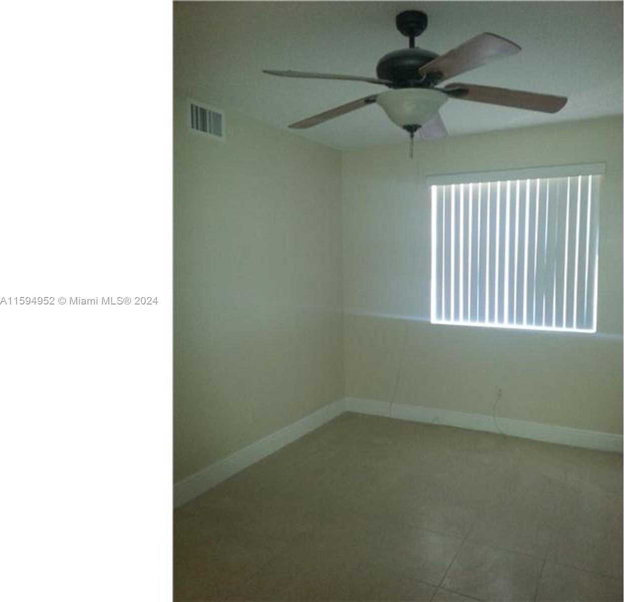 photo 2: 10024 Winding Lake Rd Unit 103, Sunrise FL 33351