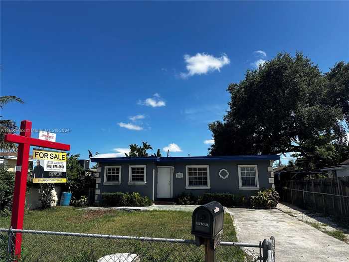 photo 1: 2910 NW 93rd St, Miami FL 33147