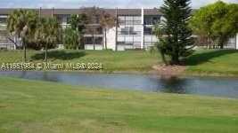 photo 2: 6100 NW 44th St Unit 405, Lauderhill FL 33319