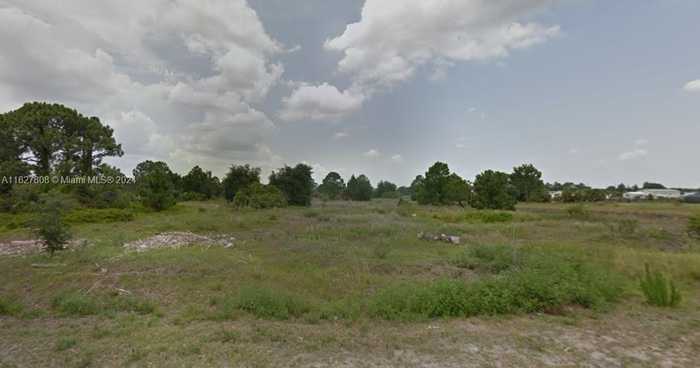 photo 1: 370 N Palomino St, Clewiston FL 33440