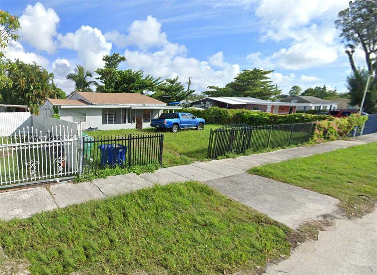 photo 2: 1235 NW 100th St, Miami FL 33147