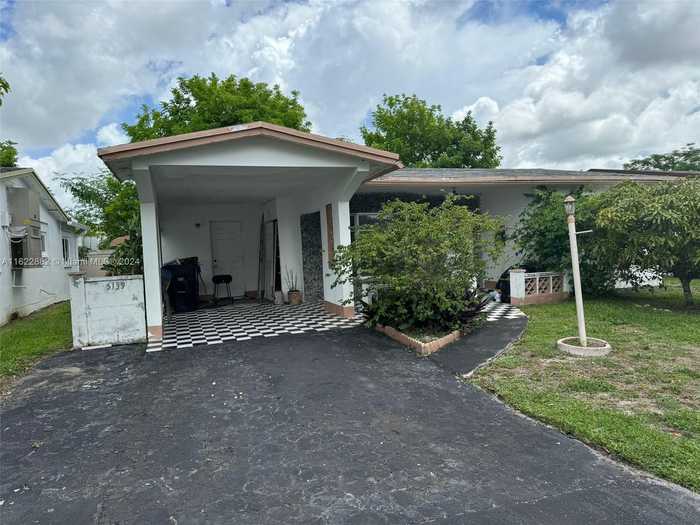 photo 1: 5139 NW 43rd Ct, Lauderdale Lakes FL 33319