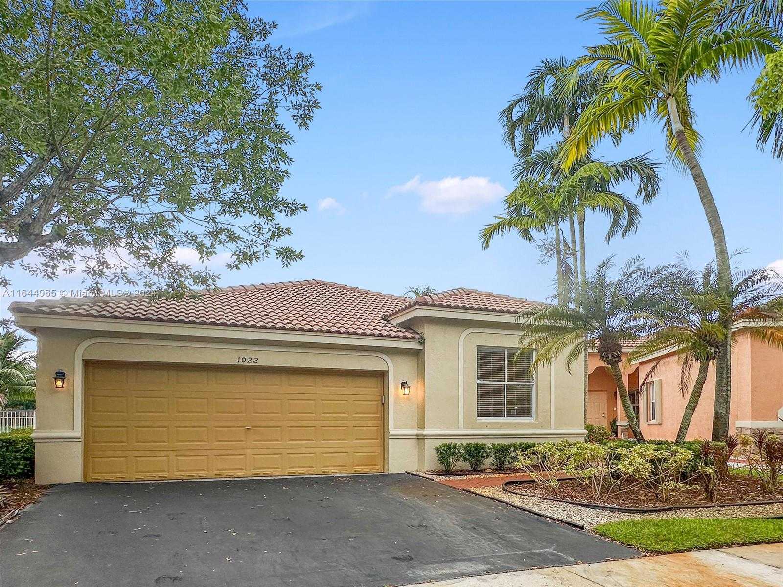 photo 1: 1022 Bluewood Ter, Weston FL 33327