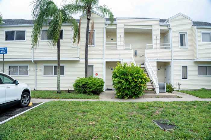 photo 1: 3421 NW 44th St Unit 205, Oakland Park FL 33309