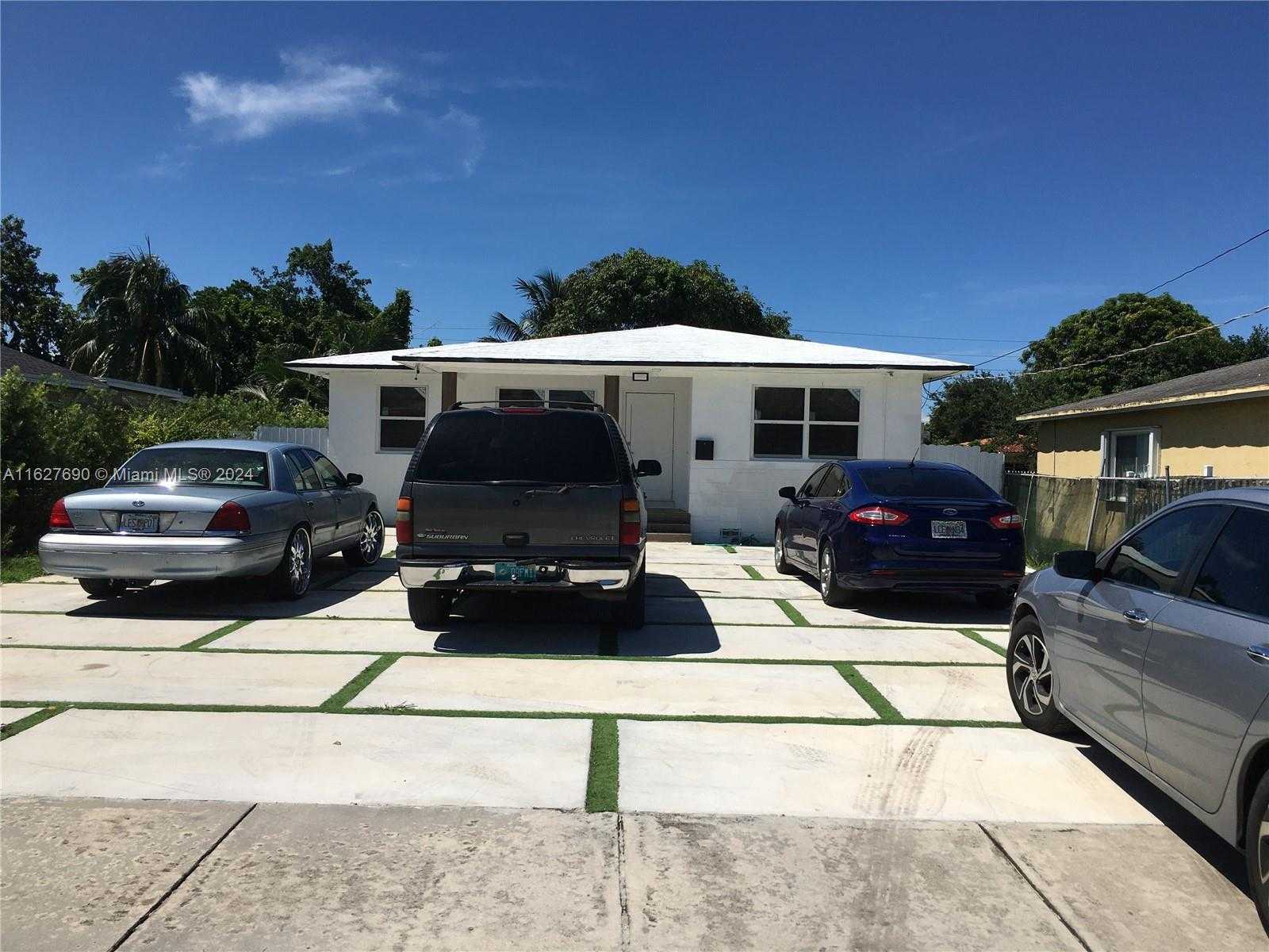 photo 1: 2151 NW 59th St, Miami FL 33142