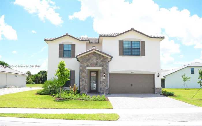 photo 1: 8161 NW 78th St, Tamarac FL 33321