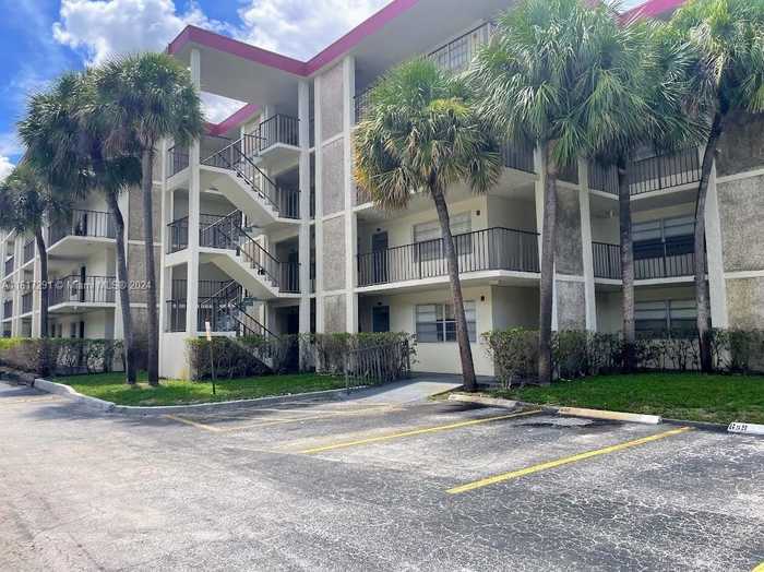 photo 1: 3000 NW 48th Ter Unit 327, Lauderdale Lakes FL 33313