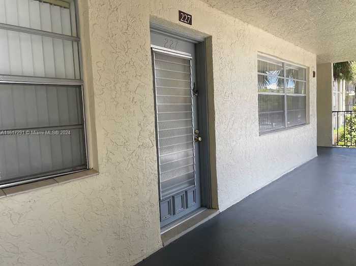 photo 2: 3000 NW 48th Ter Unit 327, Lauderdale Lakes FL 33313