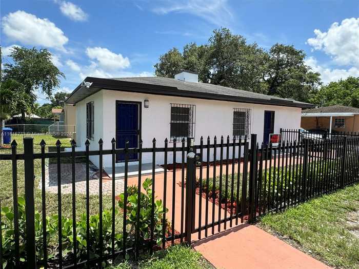 photo 1: 170 NW 64th St, Miami FL 33150