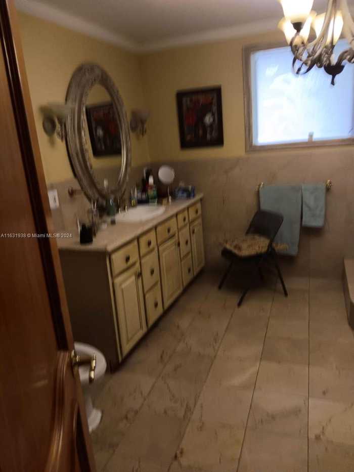 photo 2: 10861 SW 93rd St, Miami FL 33176