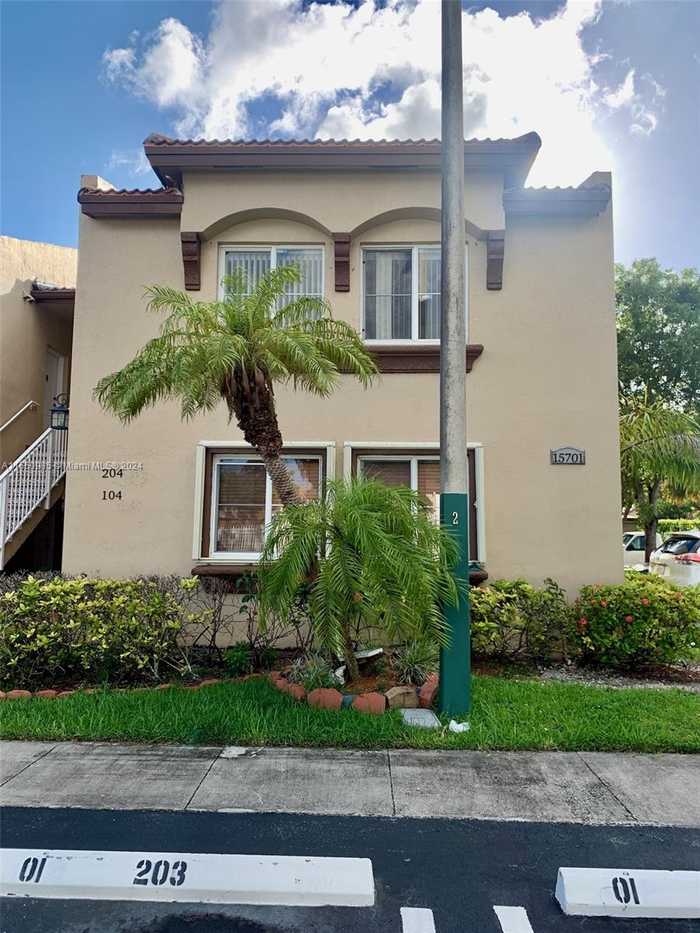 photo 1: 15701 SW 137th Ave Unit 204, Miami FL 33177