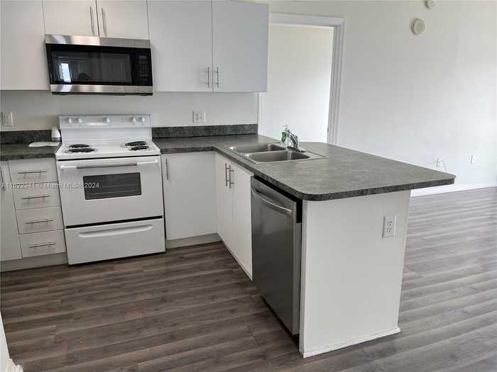 photo 2: 3410 Coral Way Unit PH-01, Miami FL 33145