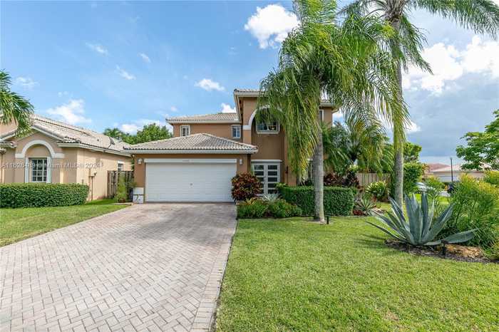 photo 1: 15458 SW 138th Ter, Miami FL 33196