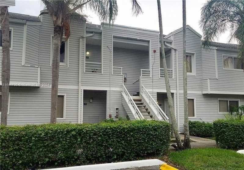 photo 1: 3469 NW 44th St Unit 101, Oakland Park FL 33309