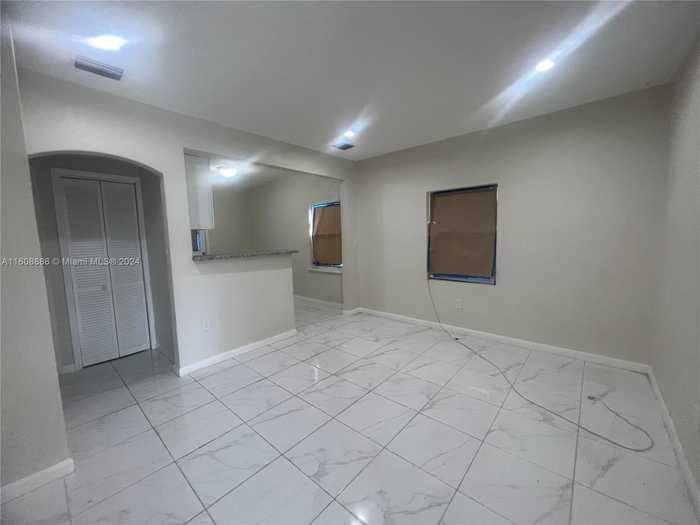 photo 2: 1778 NW 56th St, Miami FL 33142