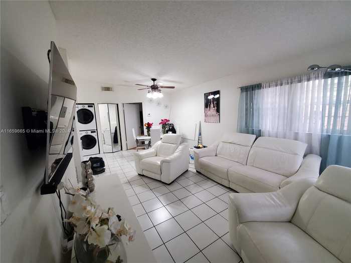 photo 1: 15328 SW 77th Ln Unit 203, Miami FL 33193