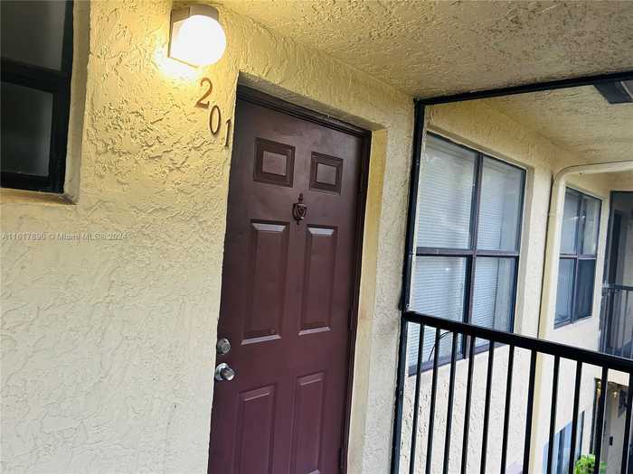 photo 1: 10017 Winding Lake Rd Unit 201, Sunrise FL 33351