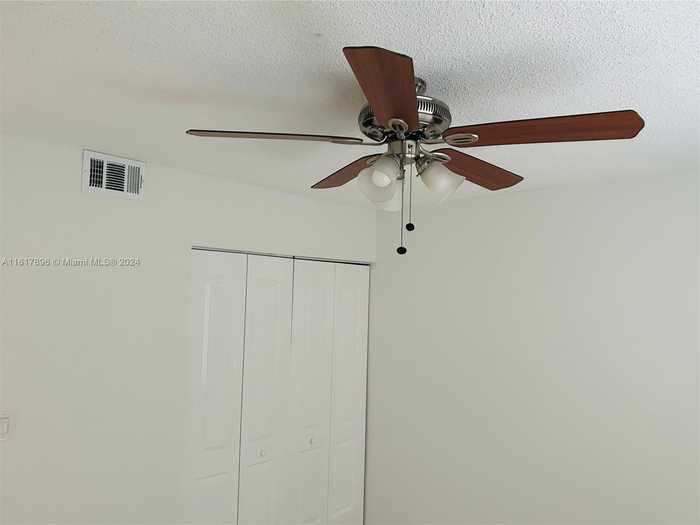 photo 7: 10017 Winding Lake Rd Unit 201, Sunrise FL 33351