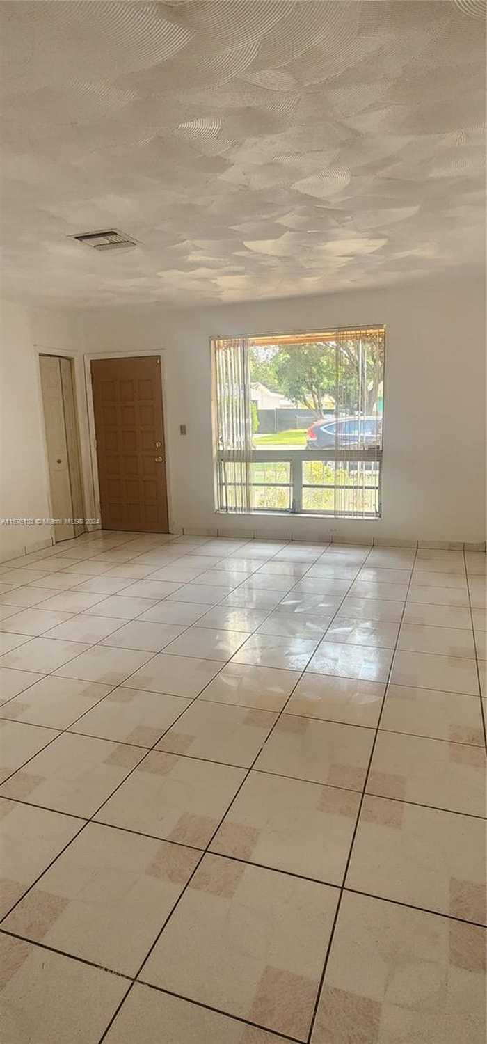 photo 2: 1055 NW 57th St, Miami FL 33127