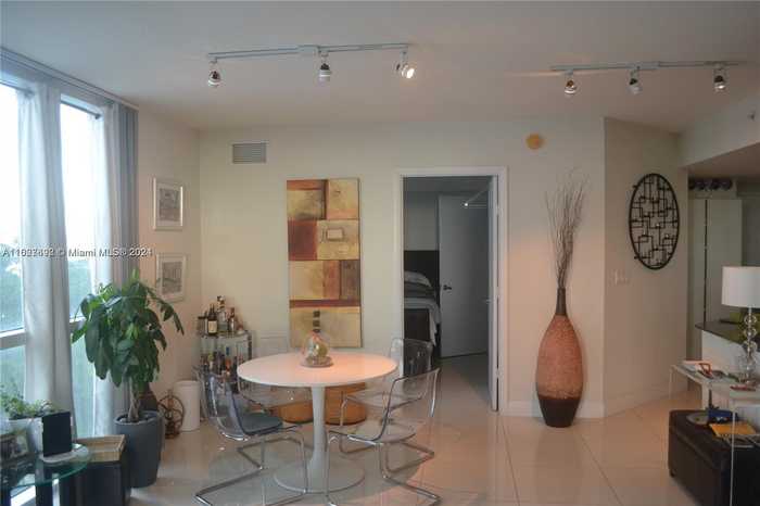 photo 2: 1871 NW S River Dr Unit 1205, Miami FL 33125