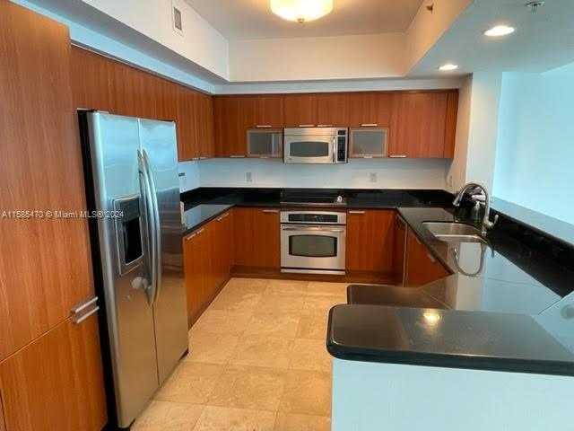 photo 1: 14951 Royal Oaks Ln Unit 2501, North Miami FL 33181