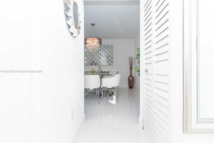 photo 1: 5445 Collins Ave Unit BAY1, Miami Beach FL 33140