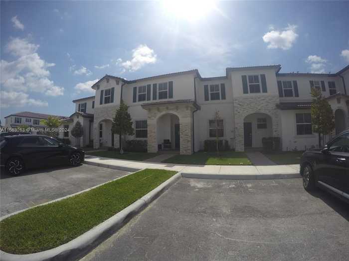 photo 1: 12221 NW 23rd Pl Unit 12221, Miami FL 33167