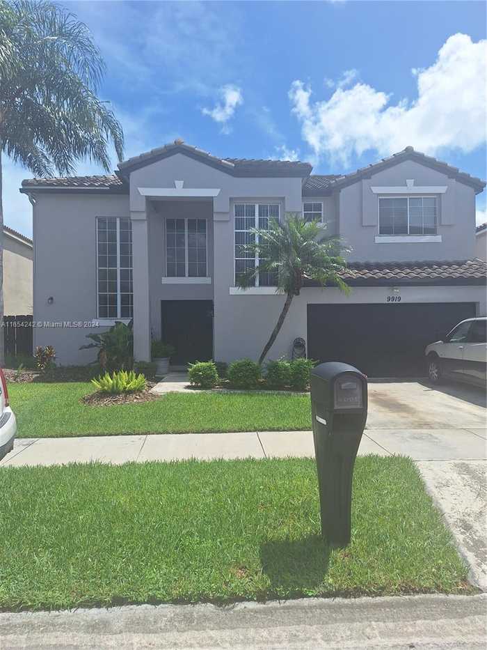 photo 1: 9919 SW 154th Pl, Miami FL 33196