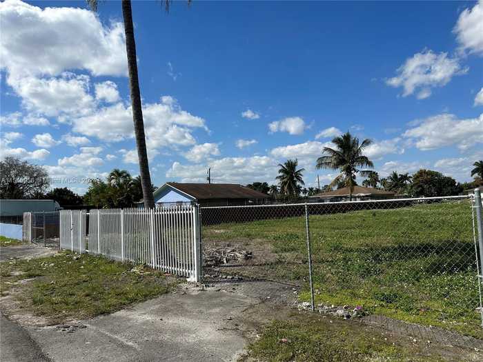 photo 2: 2111 NW 107th St, Miami FL 33167