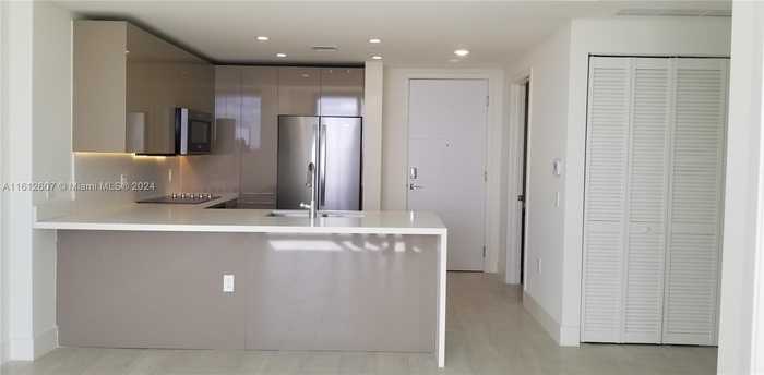 photo 1: 2000 Metropica Way Unit 1403, Sunrise FL 33323