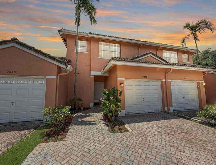 photo 1: 9050 NW 38th Pl, Sunrise FL 33351