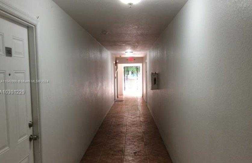 photo 2: 1021 NW 3rd St Unit 104, Miami FL 33128