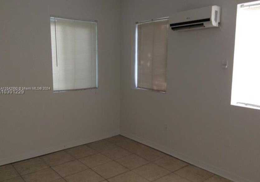 photo 3: 1021 NW 3rd St Unit 104, Miami FL 33128