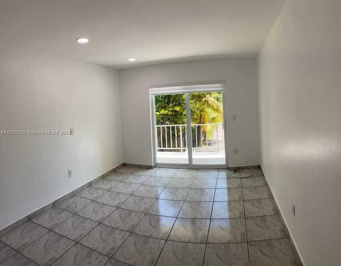 photo 2: 453 SW 2nd St Unit 107A, Miami FL 33130